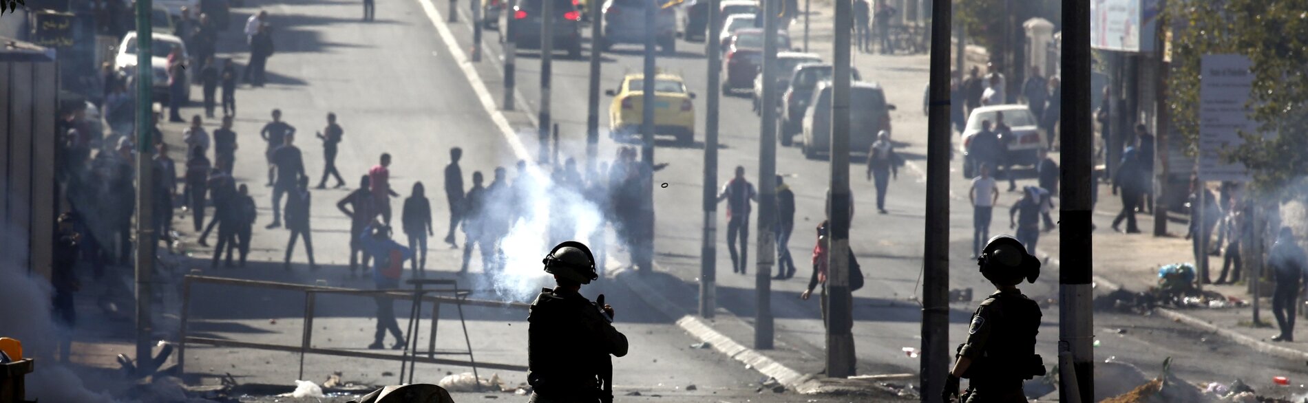 Clashes between Palestinians and Israeli forces during a protest against the US recognition of Jerusalem as Israel’s capital, Bethlehem,12 December 2017. 