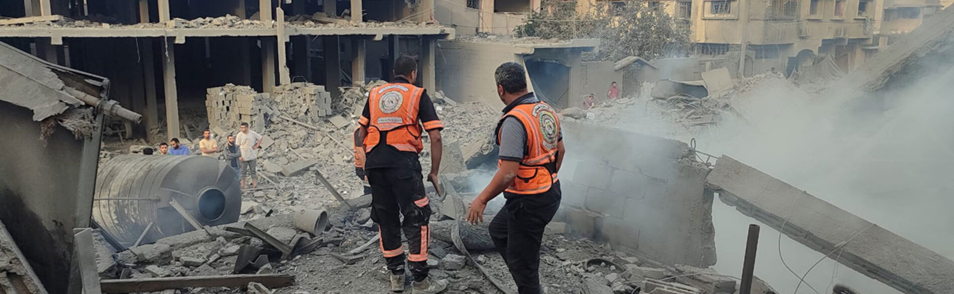 A Civil Defense team on a mission to rescue survivors and retrieve bodies from beneath the rubble in a residential area of Gaza. About 2,700 people, including some 1,500 children, have been reported missing. Eighteen Palestinian Civil Defense personnel have reportedly been killed since 7 October 2023. Photo by the Civil Defense, 2 November 2023.