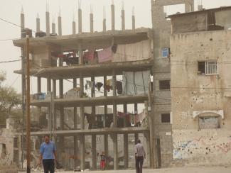 Building under construction housing IDPs; Beit Hanoun. Photo by OCHA, October 2015