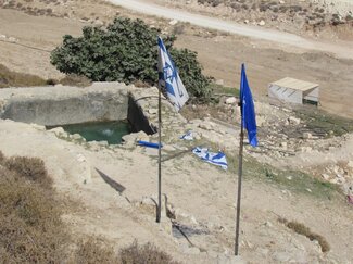  ‘Ein Fera’a pool: Tent and flag erected by settlers for the Jewish festival of Sukkot, October 2016.