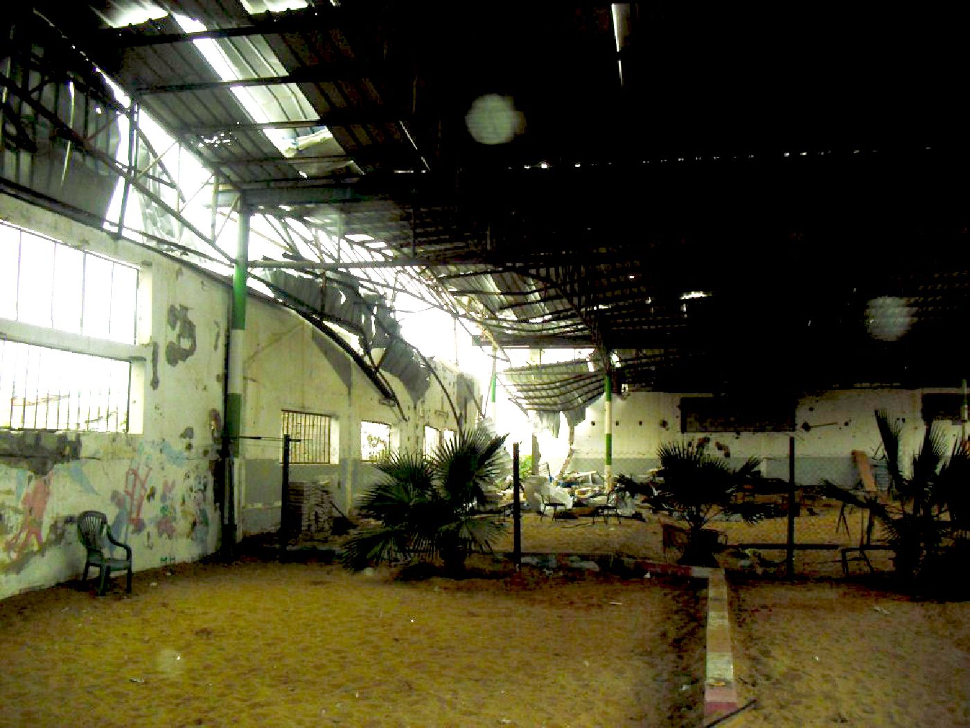 School hit by an airstrike targeting a nearby factory in Feb 2011. Photo by Bilal Al-Hamaydah, UNESCO