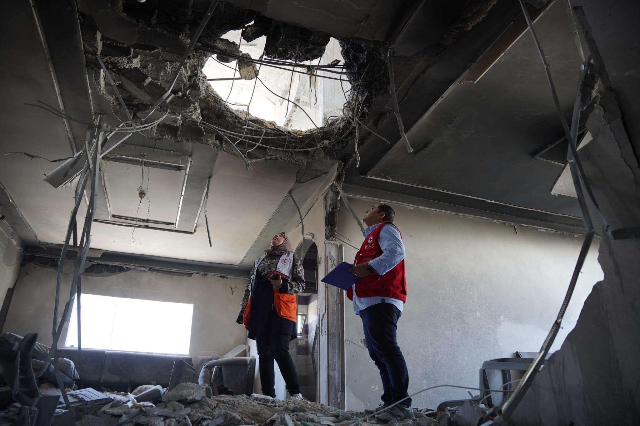 Initial assessment of damaged caused to a house during the escalation in Gaza. 13 May 2023. Credit Palestine Red Crescent Societ