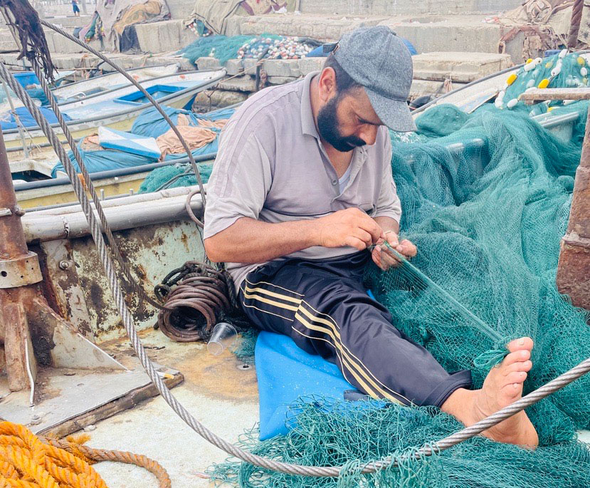 A Palestinian fisher in Gaza, where fish is one of few types of commodities allowed out. In July, they accounted for 6 per cent 