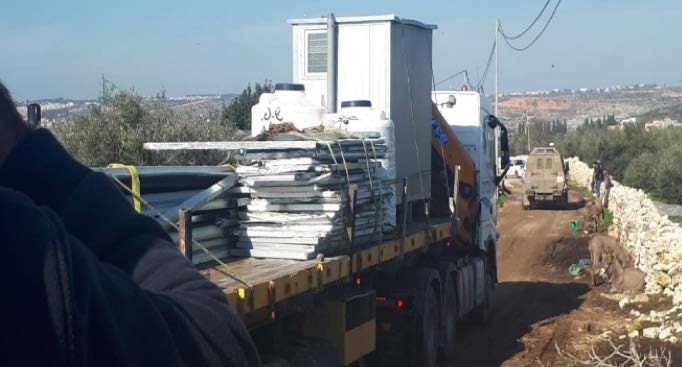 Confiscation of materials used for two EU-funded structures in Imreiha village (Jenin ) on 10 January. Photo by the local community