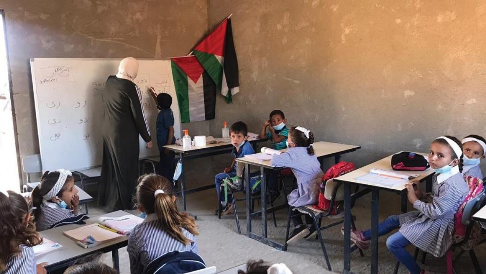 Arabic lesson in the Ras at Tin school, at risk of demolition. © Photo by OCHA