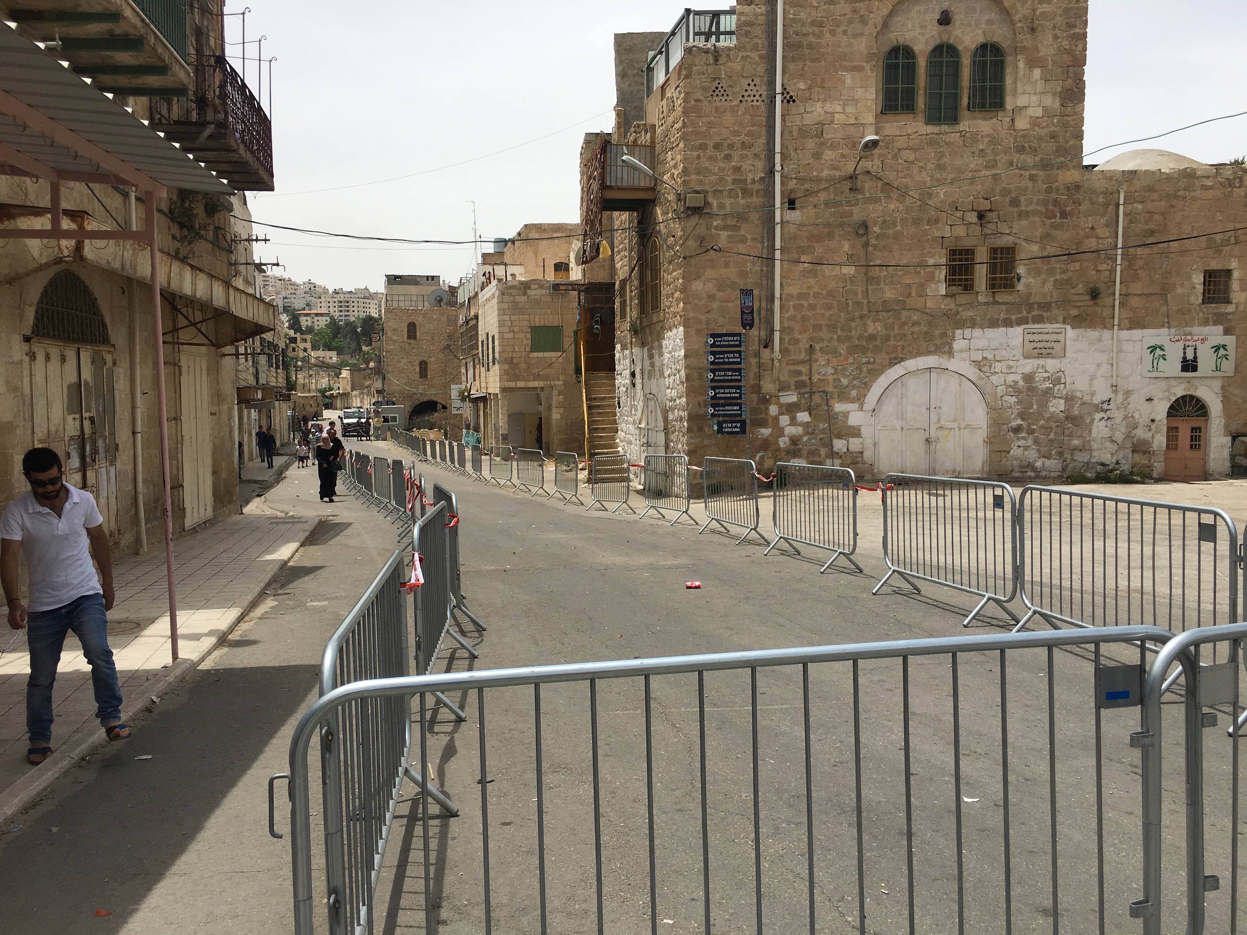 Barriers separating walking sides for Palestinians and Israeli settlers in Al Sahle street in H2.