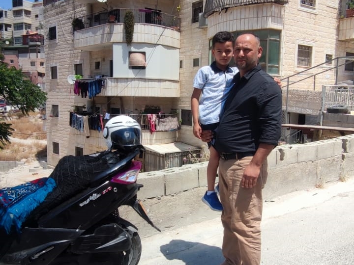 Residents of the building in Wadi Qaddum, 3 June 2022. Photo by OCHA