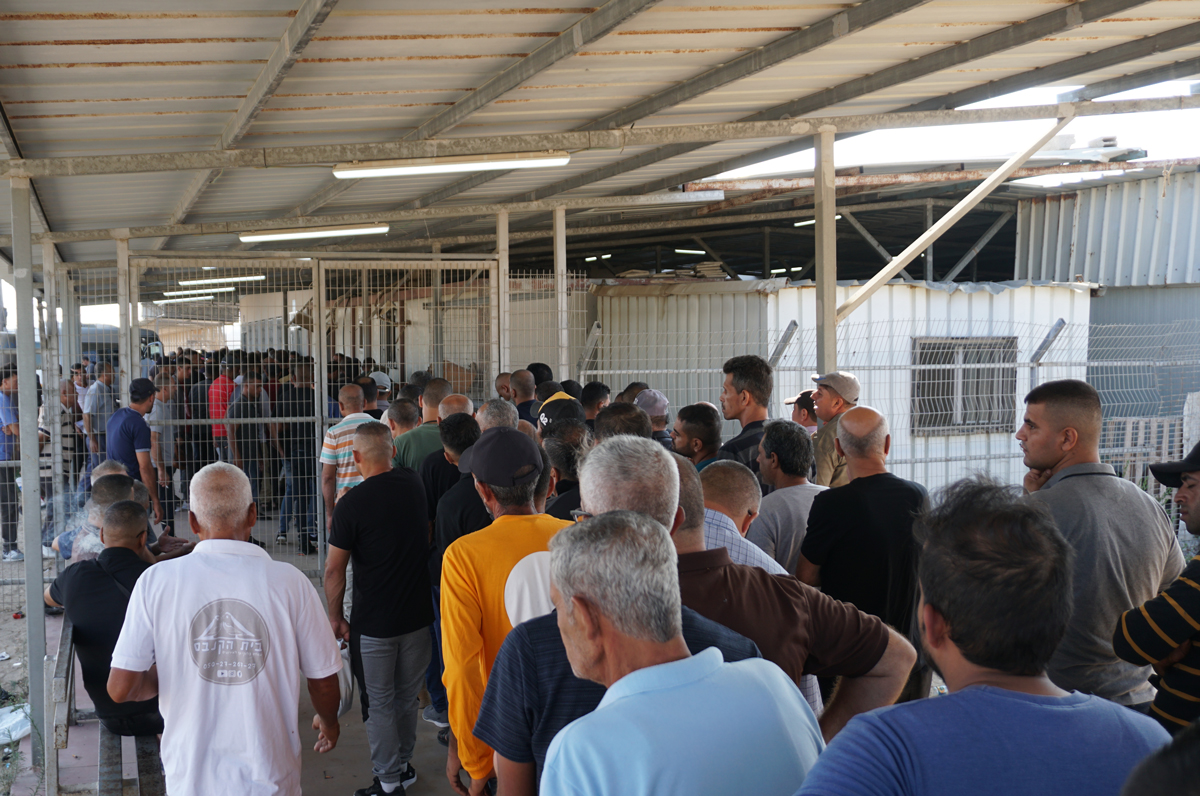 Palestinian workers at Erez crossing. Photo by OCHA