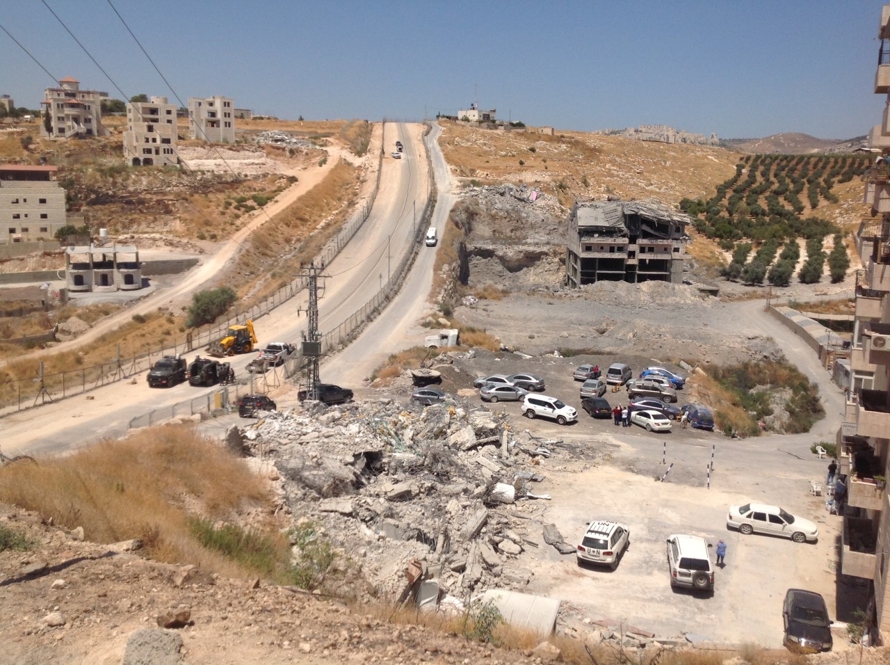 Buildings in Sur Bahir demolished on 22 July 2019 next to the security road along the Barrier. ©  Photo by OCHA