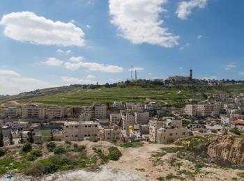 ‘Issawiya, East Jerusalem (foreground), occupied West Bank and Hebrew University (background), 2013. ©  Photo by OCHA
