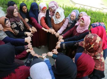 AISHA association for Women and Child Protection group session". Copyright AISHA