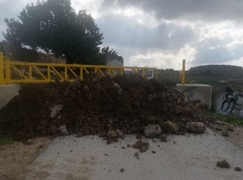 Road gate controlling access to Deir Nidham, 20 February 2020. Photo by OCHA.