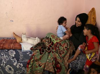 A women injured in a demonstration at the fence in Gaza. © Photo by Women Affairs Centre.