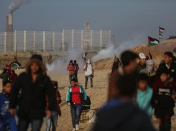 A boy in a demonstration at the fence in Beit Lahiya. Gaza, 2 February, 2018. © Photo by Mohammed Dahman