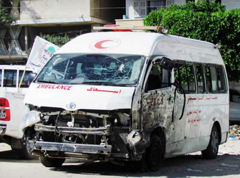 Destroyed PRCS ambulance, July 2014. Photo by OCHA