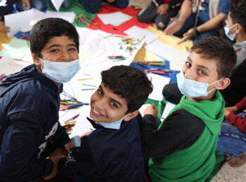 Palestinian boys at a UNICEF-supported family centre in the Gaza Strip, which offers integrated psychosocial support and protection to children affected by stress and psychosocial distress, including for children impacted by COVID-19.