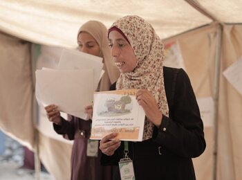 Rama facilitating an awareness-raising session in Gaza. Photo by Atfaluna