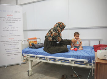 Seven-month-old Maha* with her mother in the paediatric ward of Al-Awda Hospital, North Gaza, where she received life-saving treatment, August 2024. Photo by Al-Awda