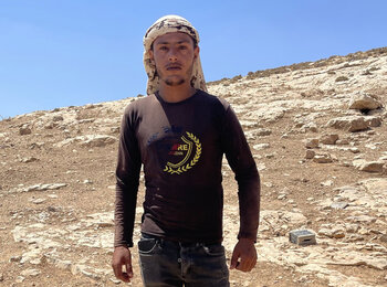 A member of the only Palestinian family remaining in Al Baqa’a following the displacement of most of the community amid settler violence. “We are not going anywhere,” he told us this week. Photo by OCHA