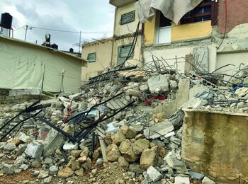 A Palestinian family forced to demolish their home in Jabal al Mukabbir, East Jerusalem. ©Photo by OCHA, 1 February 2023