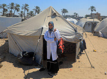 Nurse Jenin provides free services for pregnant women and for children, from a tent she set up Al Mawasi area of in Khan Younis. Photo by UNFPA Palestine / Media Clinic
