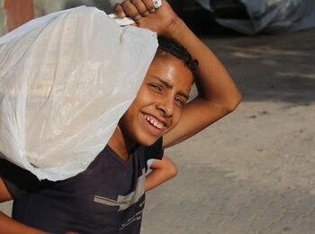 A Palestinian boy in Gaza following the declaration of a ceasefire. Photo by UNICEF