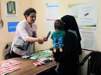 The distribution of nutrition items for children in Gaza. Photo by UNICEF/Nateel