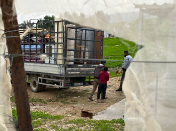 Residents of the Palestinian Bedouin community of Ras Ein al ‘Auja preparing to leave following repeated attacks, threats and acts of intimidation by Israeli settlers. Photo by OCHA