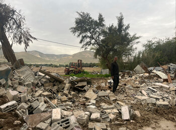 A Palestinian resident of Al Jiftlik-Abu al 'Ajaj, in Jericho governorate, following the demolition of his home for lacking building permits that are nearly impossible for Palestinians to obtain, 21 January 2025. Photo by OCHA
