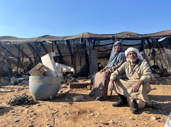 Two elderly Palestinian Bedouin preparing to dismantle their structures and leave with their families from the outskirts of Ni'lin in Ramallah governorate, due to threats and attacks by Israeli settlers. Photo: OCHA 