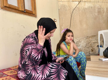 Members of a Palestinian family in East Jerusalem shortly after they were forced to demolish their own home to avoid heavy fines. This followed the issuance of a demolition order by the Israeli authorities. Photo by OCHA, 11 July 2023