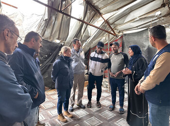 UN team, led by the Deputy Humanitarian Coordinator, speaks with one of the families in Khan Younis as part of ongoing assessments to guide lifesaving assistance. Photo: OCHA 