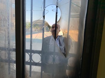 Shattered window in 'Urif school following a settler attack. Photo by OCHA, 2023