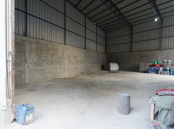 Empty warehouse of a cement mixing factory in eastern Gaza City, Nov 2016. 
