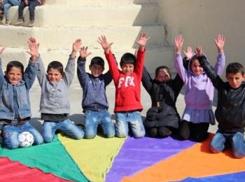 Children enjoying their time during a Psychological First Aid activity through a critical thinking game in Susiya. Photo by Jumana Rishmawi ©World Vision 2018