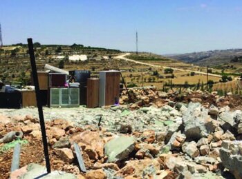 Palestinian-owned home demolished under MO1797 by the Israeli authorities in Halhul (Hebron), on 17 June 2021. Photo by OCHA.