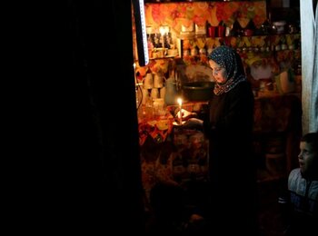 Power cut in Ash Shati refugee camp, 2014. Photo by Wisam Nassar