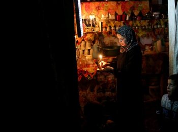 Power cut in Ash Shati refugee camp, 2014. Photo by Wisam Nassar