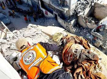 A Civil Defence team member works to safely dismantle a wall at risk of collapse in a high-rise building struck during hostilities in Rafah, Gaza's most densely populated area, where a large number of displaced people are seeking relative safety. Photo by the Civil Defence, 10 January 2024. 
