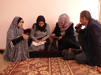 OCHA team surveying a displaced family in Rafah, December 2015