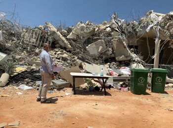 Between 9 and 15 June, 30 people were displaced due to demolitions across the West Bank. A newly displaced Palestinian standing next to what remains of his home, following a demolition by Israeli forces in Barta’a enclave, between the Barrier and the Green Line, 14 June 2026. Photo: OCHA