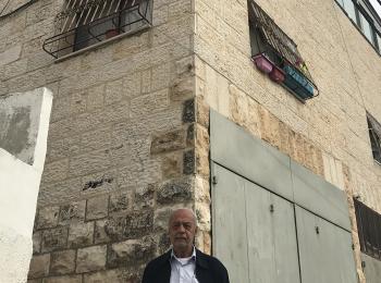 Mr. Sabbagh standing in front of the family house. December 2018. ©  Photo by OCHA