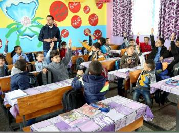 Students at Al Bahrain Elementary Boys School continue their lessons after UNMAS clearance, October 2019. Photo by Khalil Adwan.