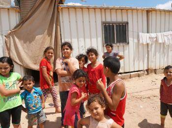 Internally displaced children next to their temporary shelter, Beit Hanoun, Gaza, August 2017. © Photo by OCHA.