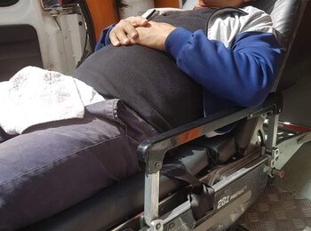 Naji Tanatra at the ambulance that evacuated him to the hospital.