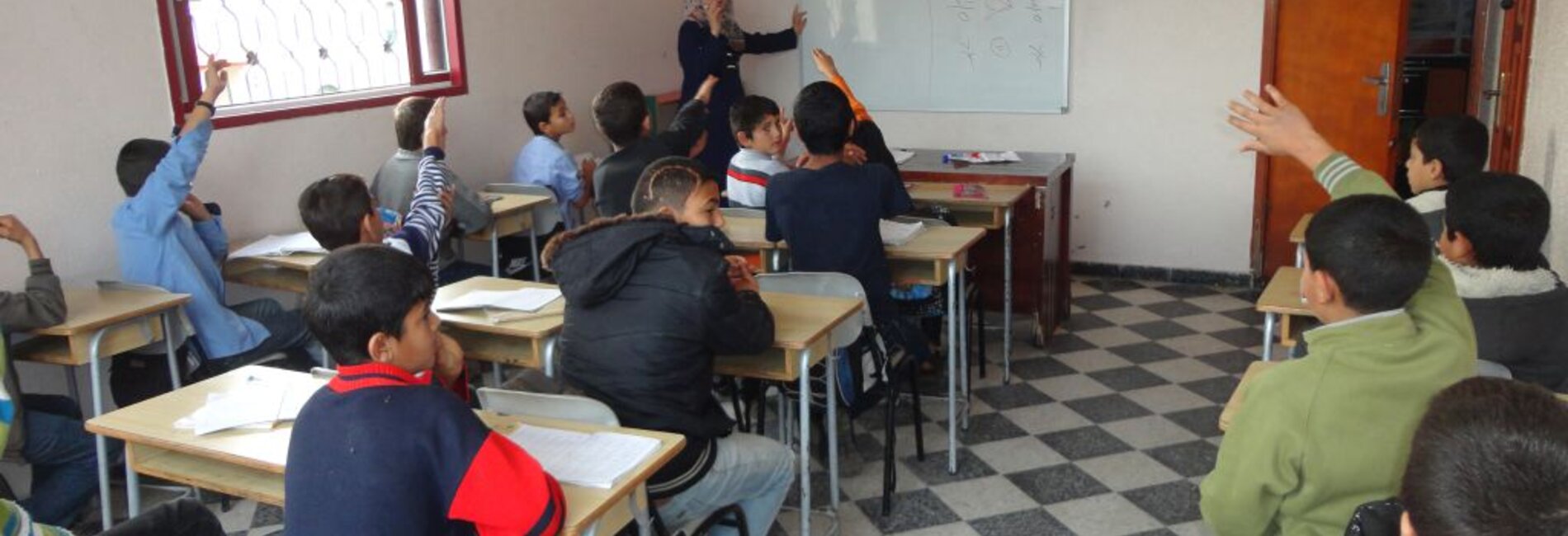 Working and dropped out of school children attending a mathematics class at Tdh child protection centre. ©  Photo by Terre des hommes