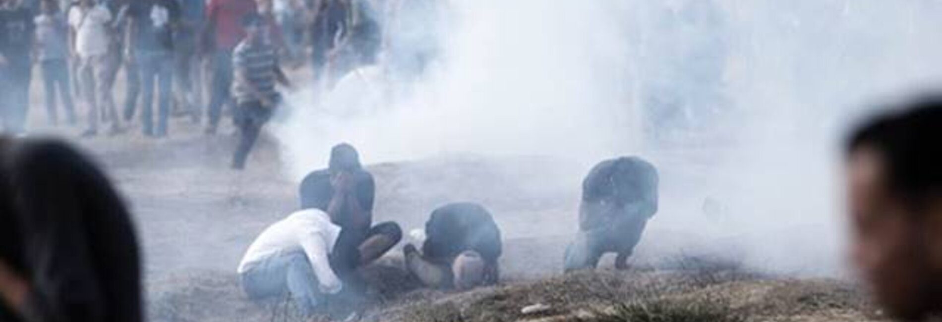 Demonstrators overcome by teargas at the Gaza fence, March 2019.