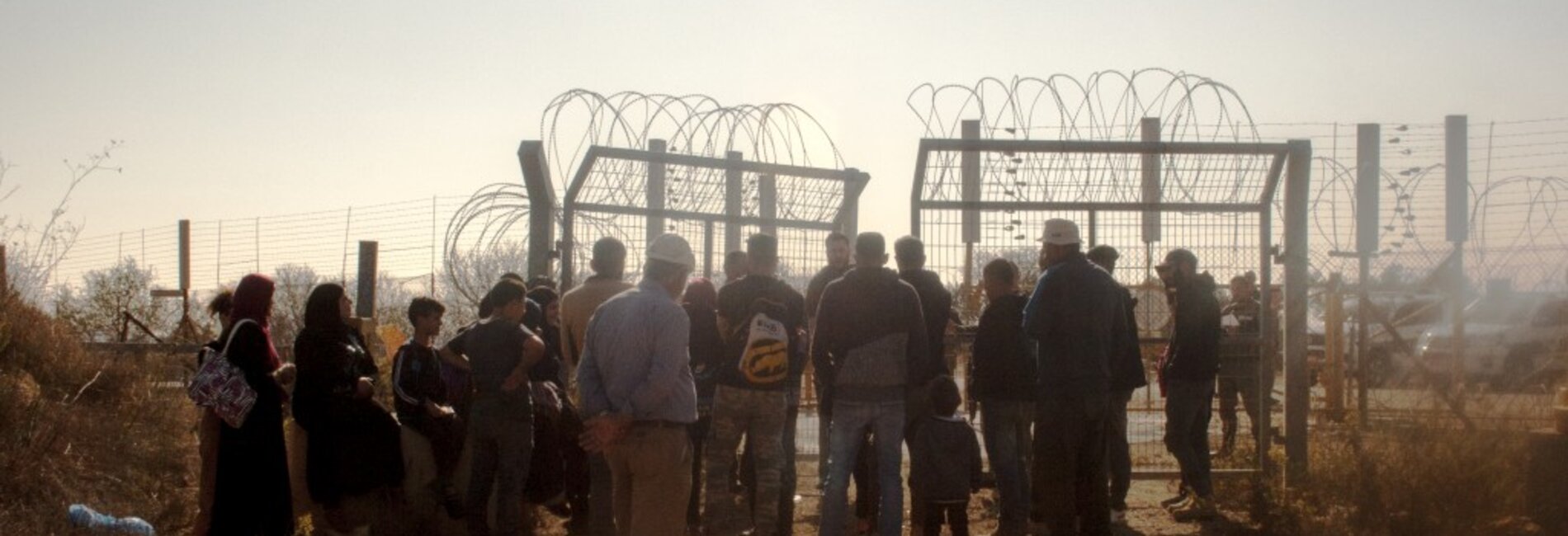 Farmers waiting to access their olive groves behind the Barrier, next to Beit Surik village (Ramallah), 31 October, 2019. ©  Photo by OCHA