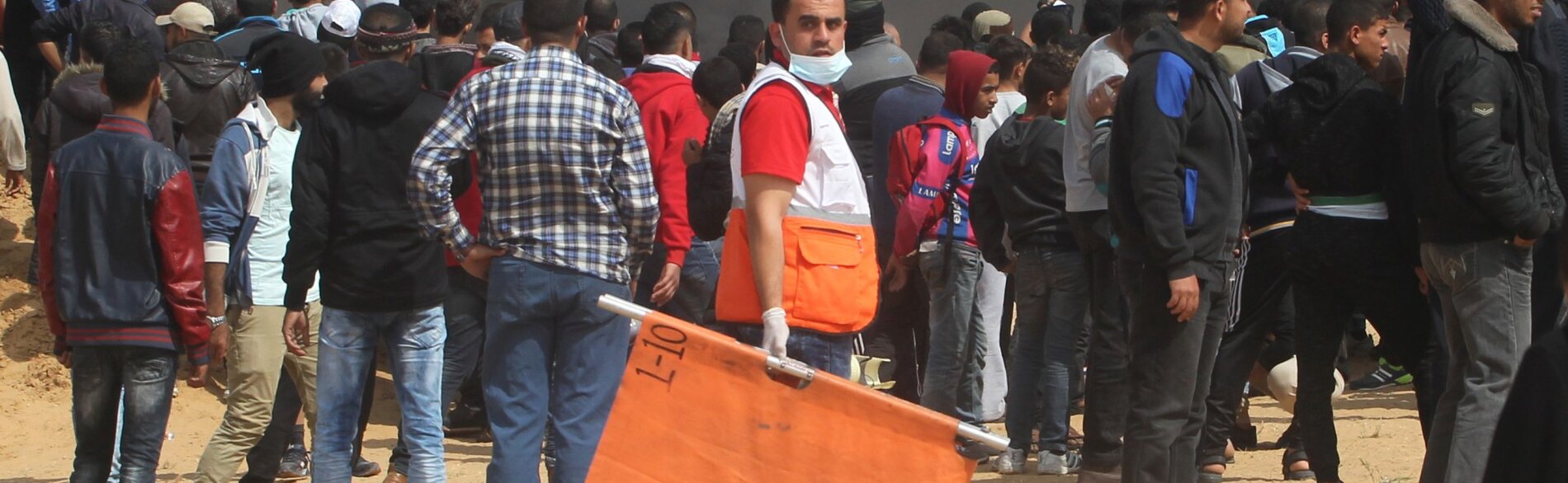 A member of the Palestine Red Crescent Society attends the Great March of Return demonstrations on 27 April 2018 to provide health support to those injured.