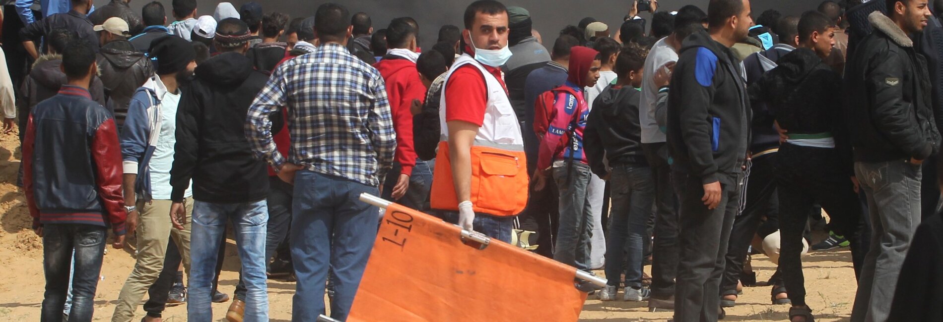 A member of the Palestine Red Crescent Society attends the Great March of Return demonstrations on 27 April 2018 to provide health support to those injured.